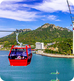 photo of a marine cable car operating during the day